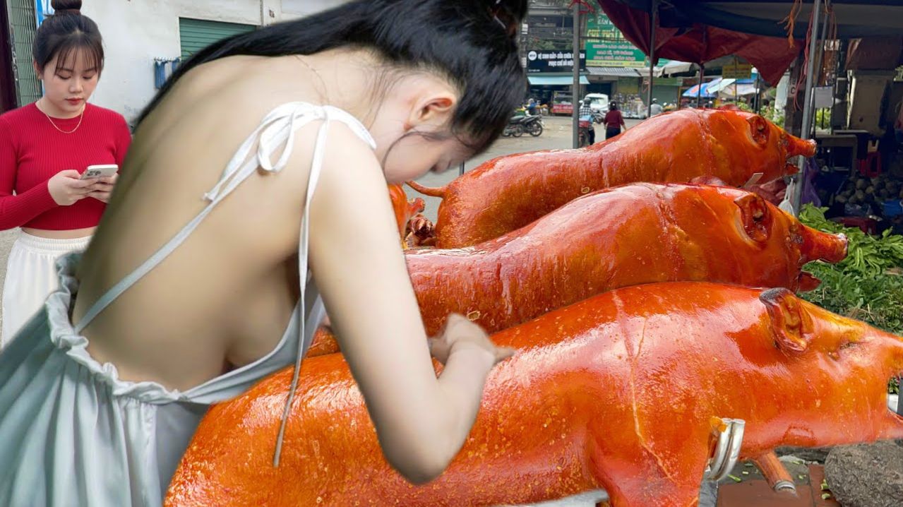 Девушка рубит жареного поросенка так же легко как бананы