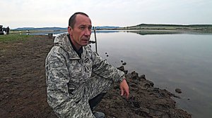 Крупный карась на донки.