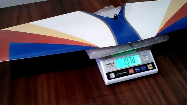 97- Взвесил готовый стабилизатор.