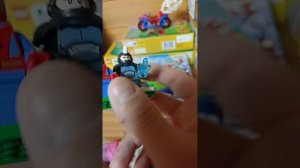 lego spider on his motorcycle vs rhino