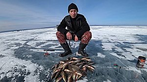 Рыбалка на окуня в марте на озере Арахлей.