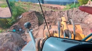 Строительство, планировка территории с помощью погрузчика