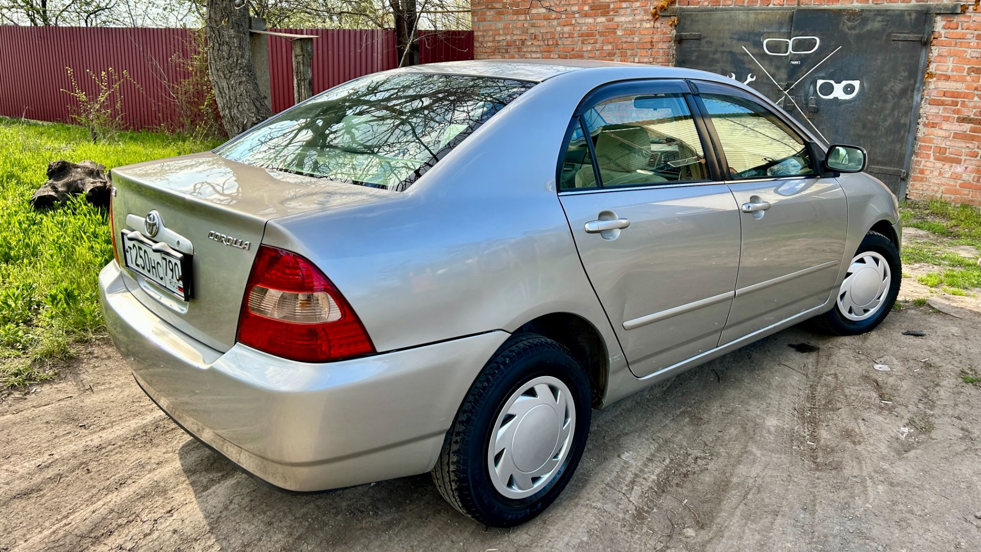 осмотр TOYOTA Corolla'01