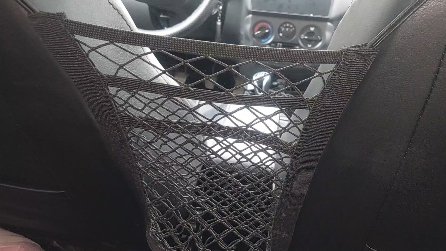 Лада гранта кросс Ставим сетку карман между передних сидений