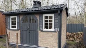 Хозблок с обшивкой фасадной плиткой от Малинки