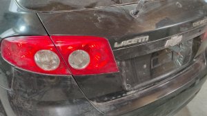 Как снять задния поковой фонарь Шивроле лачети