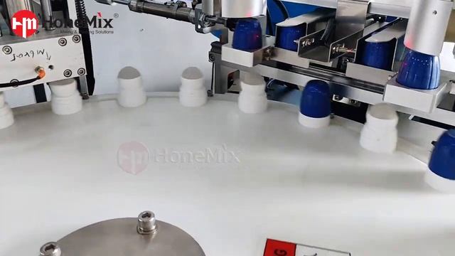 Полноавтоматическая машина для розлива и укупорки дезодорантов с двумя головками