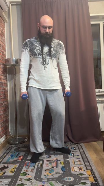 Приседания с гантелями внизу (на прямых руках)