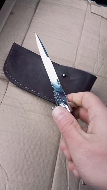 Выкидной нож из стали M390