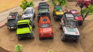 Радиоуправляемые машинки в песочнице с новыми препятствиями.