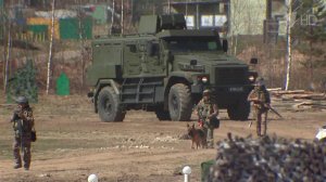 Перед отправкой на фронт росгвардейцы проходят тренировки на полигоне.