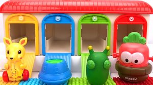 Мультики малышам. Залипалки. Радужные мячики-сжимайки и разноцветный гараж. Забавные игрушки.