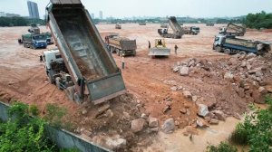 The Extremely Land Filling Heavy Equipment Work- Bulldozer Pushing Rocks vs Dump Truck Dumping Rocks