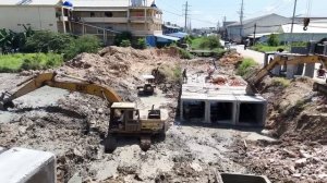 Filling Land By Dump Truck Unloading soil Delete Drain with Excavator-004