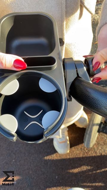 Подстаканник для коляски с отделением для телефона и мелочей.