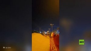 ومضات ضوئية في سماء طهران خلال مسيرة وسط أنباء عن "تفعيل الدفاعات الجوية" في العاصمة الإيرانية