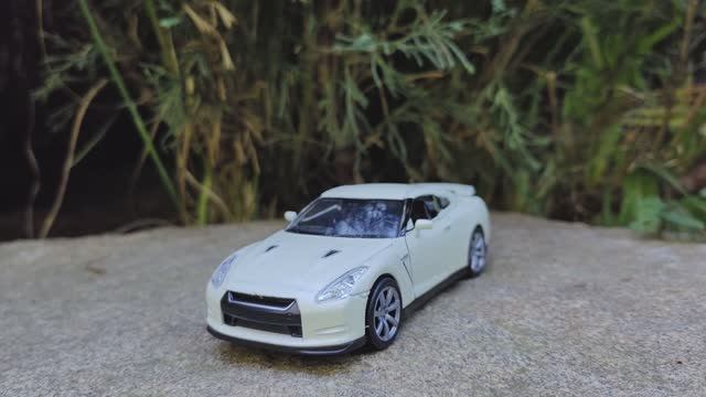 Модель Nissan GT-R, R 35 от welly