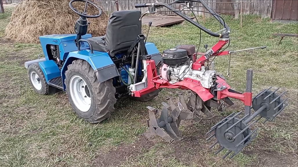 Опорные катки, дополнительные секции фрез на мотоблок Угра, навешанного на СМТ Василëк