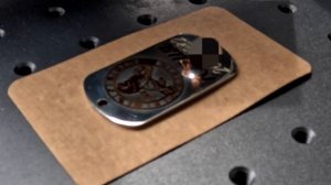 Таймлапс гравировки жетона со знаком зодиака