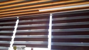 Темно-коричневые рулонные шторы Зебра для создания атмосферы спокойствия и роскоши.