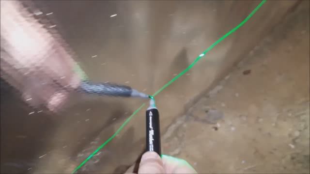 Разметка пола в бане лазерным уровнем: отбиваем нулевой уровень