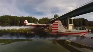 Як-52. Пролёт тройкой под мостом: В.Чкалов х 3