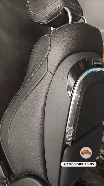 Дополнительные столики с подсветкой на спинке кресел превратят поездку в Mercedes GLS в комфортный д