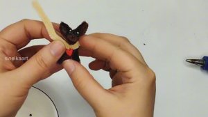 Миниатюрная собака из синельной проволоки