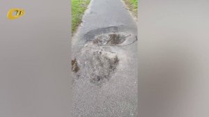 ПРОБЛЕМА С ПРОВАЛИВШИМСЯ ЛЮКОМ ПО УЛ. ОКТЯБРЬСКОЙ УСУГУБИЛАСЬ ПОСЛЕ ПРОШЕДШЕГО ДОЖДЯ