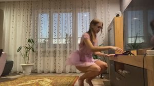 Girl in dress clean TV