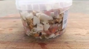 Морской коктейль из море продуктов в масле