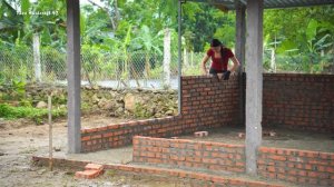 Building Strong Livestock Barn： Installing Roof Panels and Finishing Brick Walls for Protection