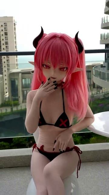 Latex Succubus Kigurumi Doll in bikini.