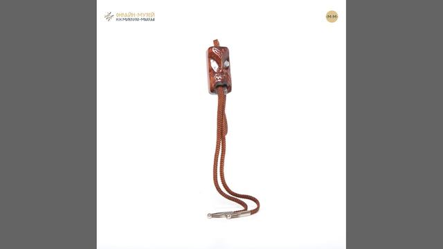 Гайтан с амулетом в виде головы предка моко Новая Зеландия