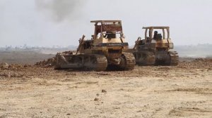 Massive 10 Wheel Dump Truck Unloading Dirt For Lake Filling Project
