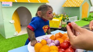 BiBi harvests fruit to make fruit candy for Ody cat