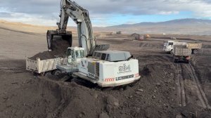 Caterpillar D9T Bulldozer Pushing Overburden On Liebherr 984 Excavator