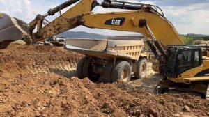 Caterpillar 385C  Excavator Loading Caterpillar 777 Dumpers On Constr. Site - Sotiriadis⧸Labrianidis
