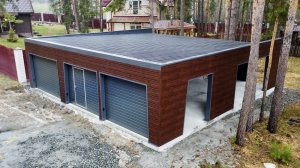 121 м² размаха: Гараж 11×11 м с навесом и хозблоком в стиле Хайтек. Обзор из Екатеринбурга