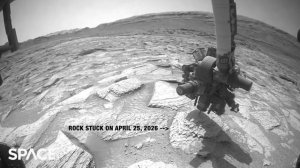 Инженеры NASA неделю колдовали над марсоходом, чтобы сбросить 13-килограммовую глыбу