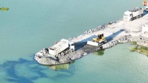 Строительство, засыпка дороги на озере, высотные съёмки
