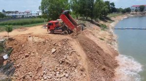 Wow! Amazing! Making Landfill into Deep Pond Using D20P Dozer Pushing Stones with Dump Truck Unload