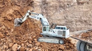 Liebherr 984 Excavator Loading Caterpillar 777 Dumpers