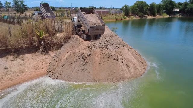 OMG !! Process Delete Deep Pond Using Soilrock By Expert Driver Dozer With 10Ton Dump Trucks