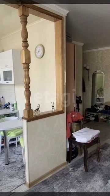 12761219