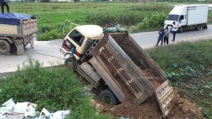 OH NO! A little while ago a 5 ton truck got accident while try to unload soil was slipped into pond