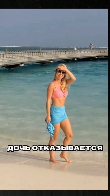 Притянула акулу на мелководье