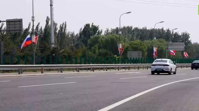 Пекин украсили российскими и китайскими флагами к приезду Путина в КНР. Визит президента РФ ...
