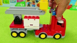 LEGO Duplo железная дорога, животные, грузовик, карусель с лошадками — распаковка игрушек