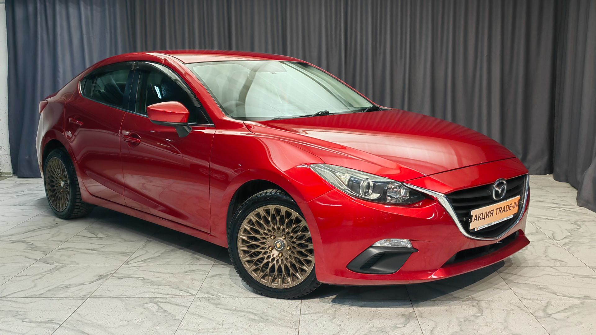 Обзор Mazda Axela 2014 года выпуска